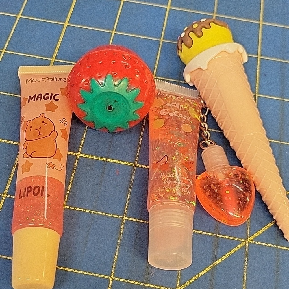 Lot of 4  Lip Gloss & Plumper New
